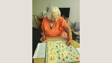 Scrabble board game helps Bath care home Resident build self-confidence